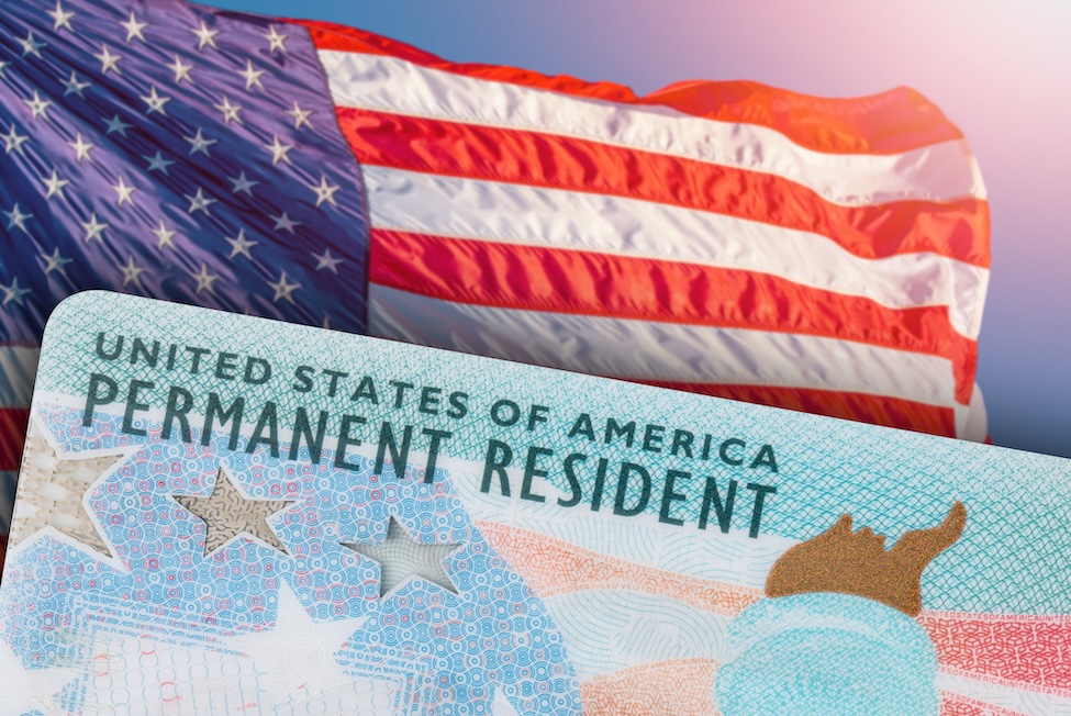 Green Card US Permanent resident card. Immigrant ID documents. USA Electronic Diversity Visa Lottery DV-2024 DV Lottery Results. United States of America. American flag on background
